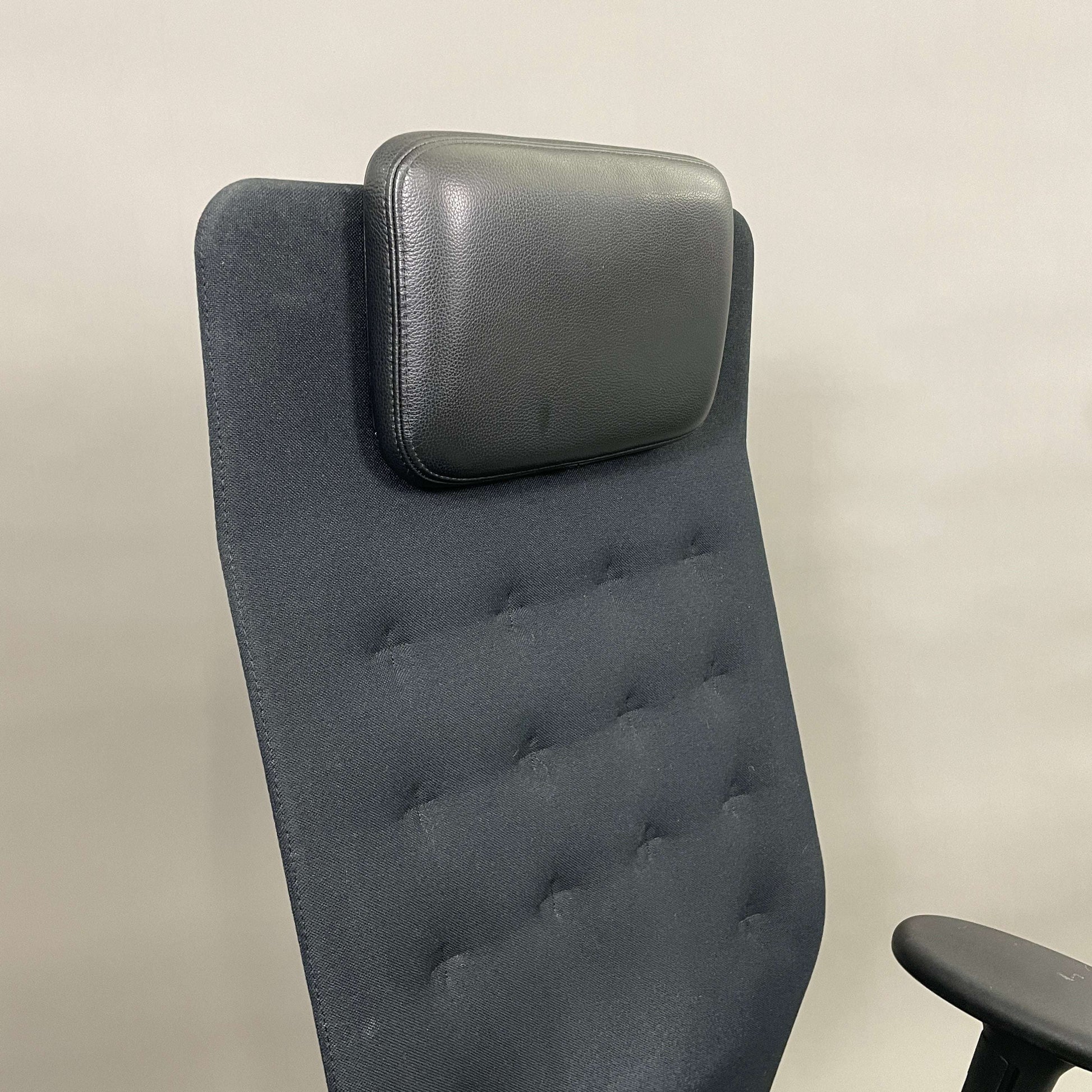 Vitra ID Trim L black fabric office chair with adjustable leather headrest and ergonomic features