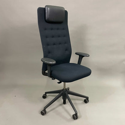Vitra ID Trim L ergonomic office chair with black fabric seat and leather headrest, adjustable height and lumbar support