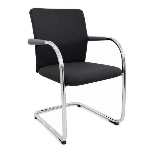 Vitra ID Visitor Soft Freischwinger in Dunkelgrau mit verchromtem Gestell und Armlehnen vor weißem Hintergrund.