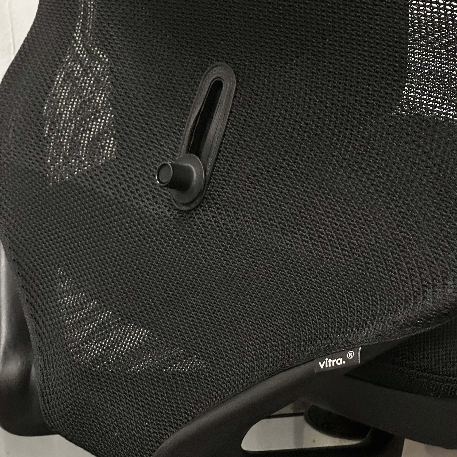 Vitra Meda Pro black ergonomic office chair with adjustable lumbar support and breathable double-layer mesh backrest