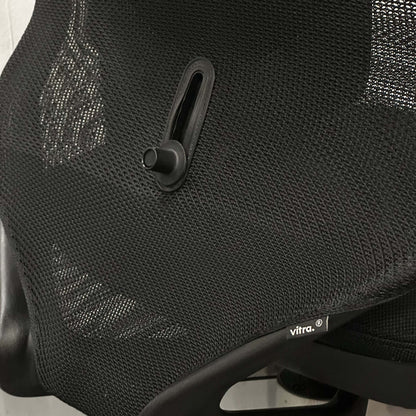 Vitra Meda Pro black ergonomic office chair with adjustable lumbar support and breathable double-layer mesh backrest