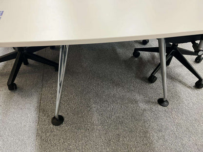 Vitra Medamorph conference table 320x130cm with sleek metal legs and white tabletop in modern office setting