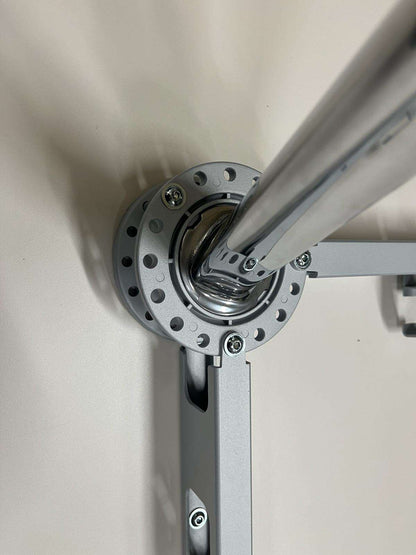 Close-up of the metal joint and frame structure of the Vitra Medamorph meeting table leg