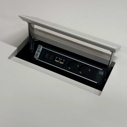 Vitra Medamorph meeting table with built-in power and USB ports in white surface