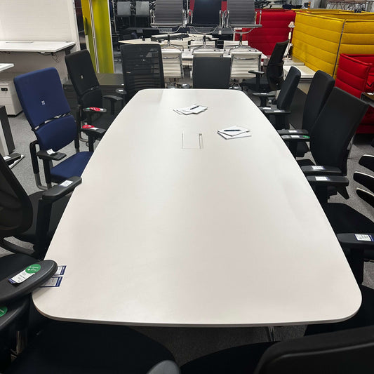 Vitra Medamorph large modern white conference table surrounded by office chairs in meeting room