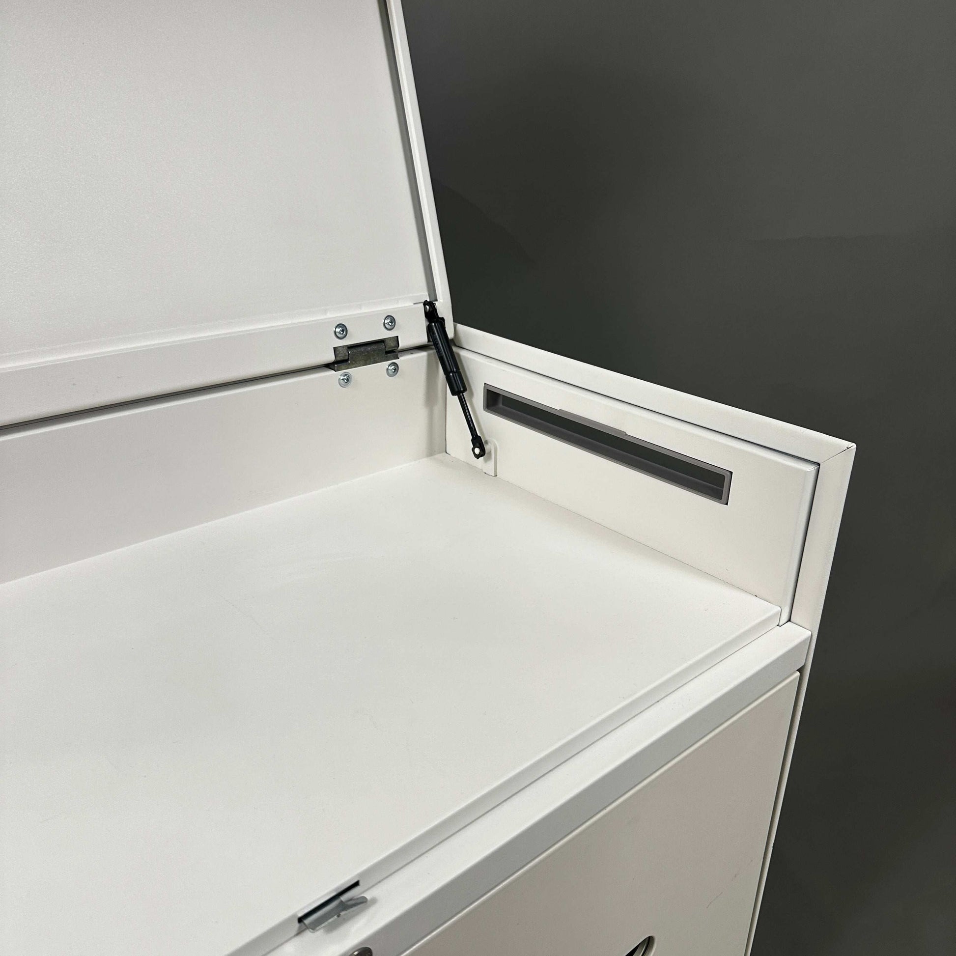 White Vitra PickUp Container with foldable top compartment, handle, and cable outlet, measuring 77x63.5x40 cm