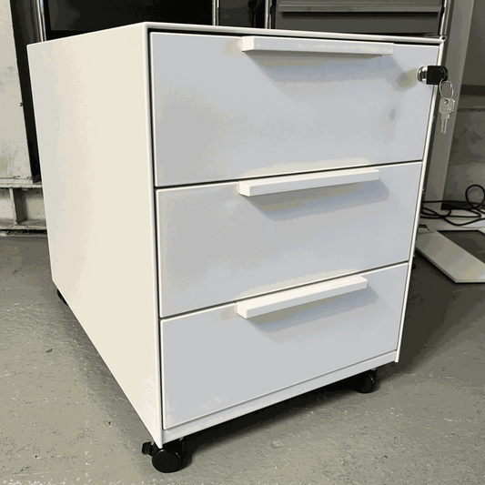 White Vitra Rollcontainer with metal body, plastic fronts, three drawers, and wheels, measuring 42x54x61cm
