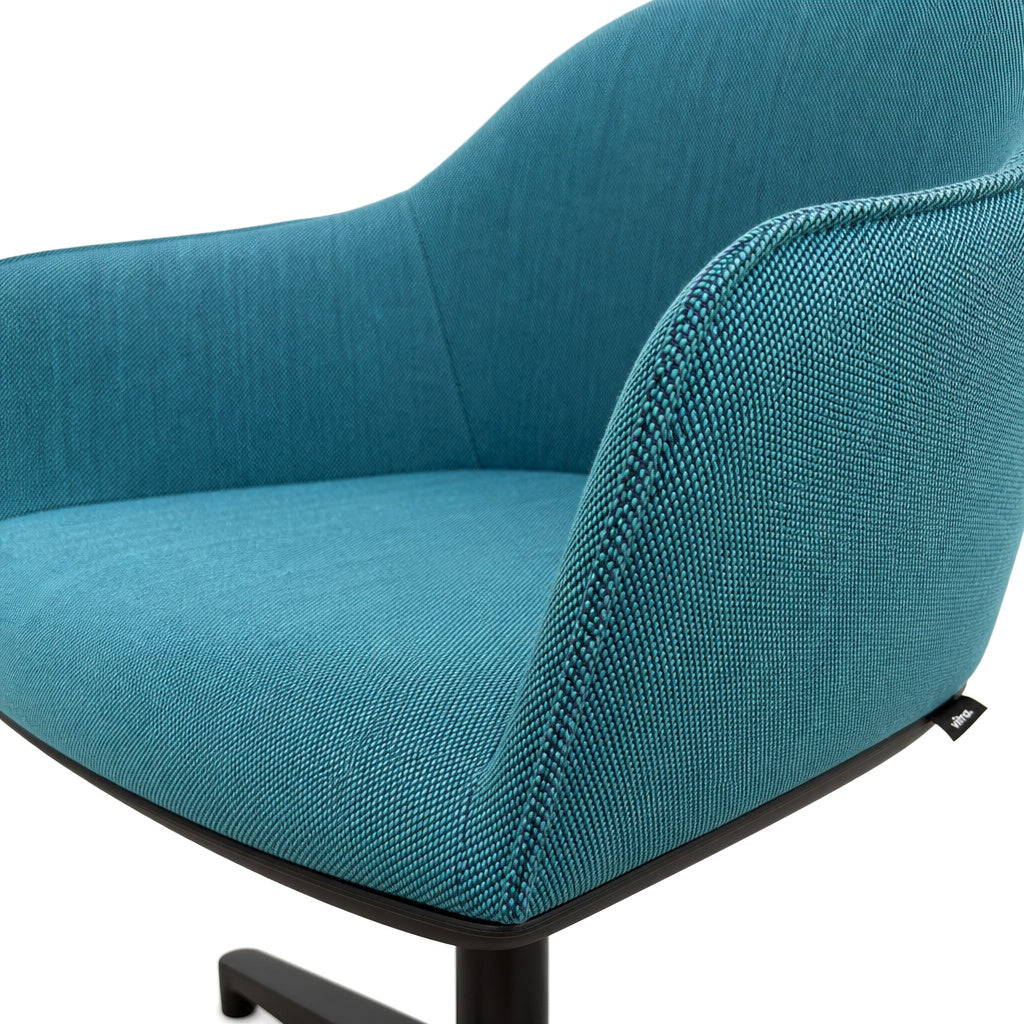 Vitra Softshell Chair in petrol Steelcut Trio fabric with a black aluminum base.