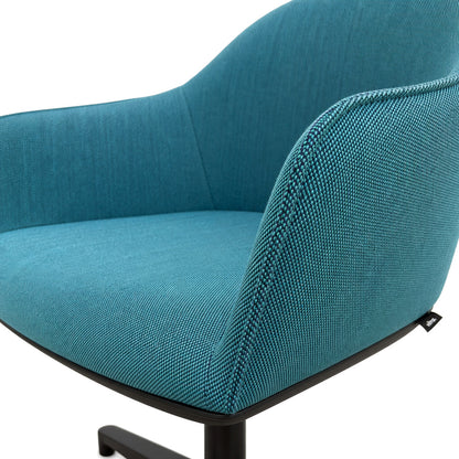 Vitra Softshell Chair in petrol Steelcut Trio fabric with a black aluminum base.