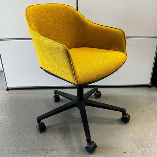 Yellow Vitra Softshell Drehstuhl ergonomic office chair with black five-star base and casters