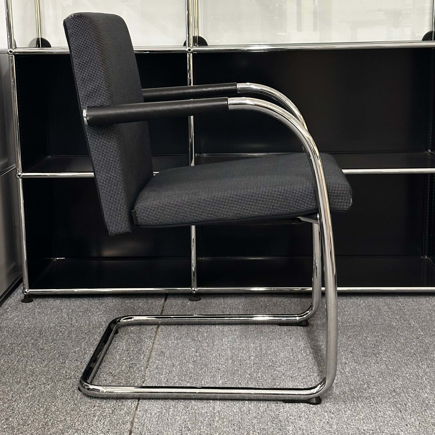 Vitra Visasoft black and gray fabric visitor chair with chrome cantilever frame and armrests