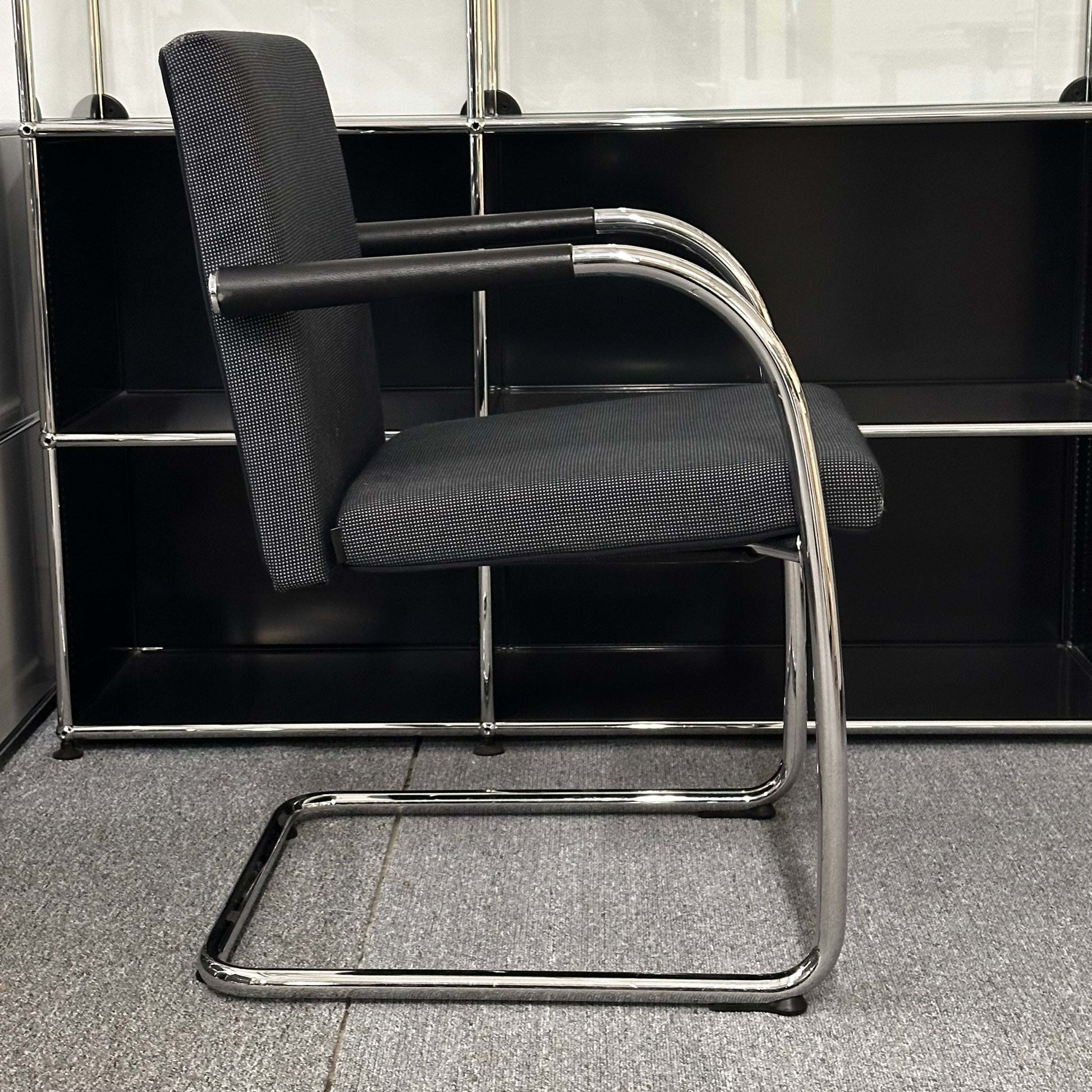 Vitra Visasoft black and gray fabric visitor chair with chrome cantilever frame and armrests