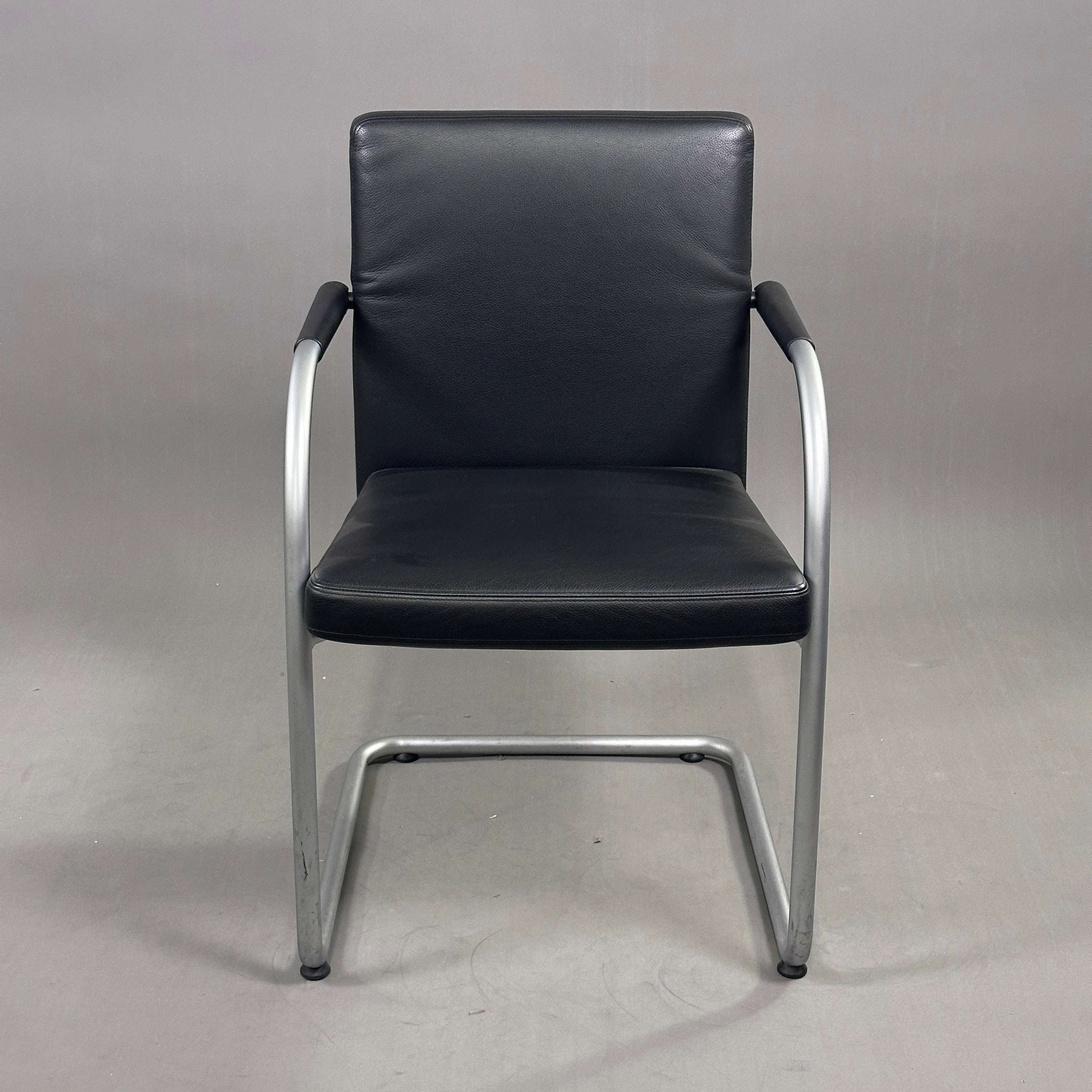 Vitra Visasoft chair with black leather upholstery and chrome frame