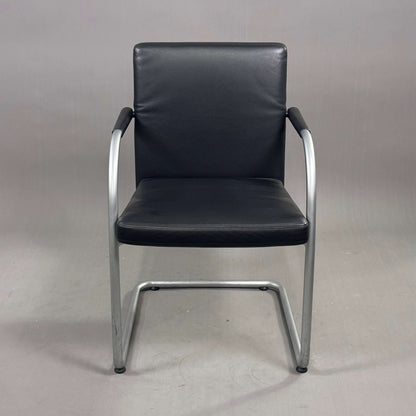 Vitra Visasoft chair with black leather upholstery and chrome frame