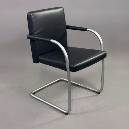Vitra Visasoft chair with black leather upholstery and chrome cantilever frame