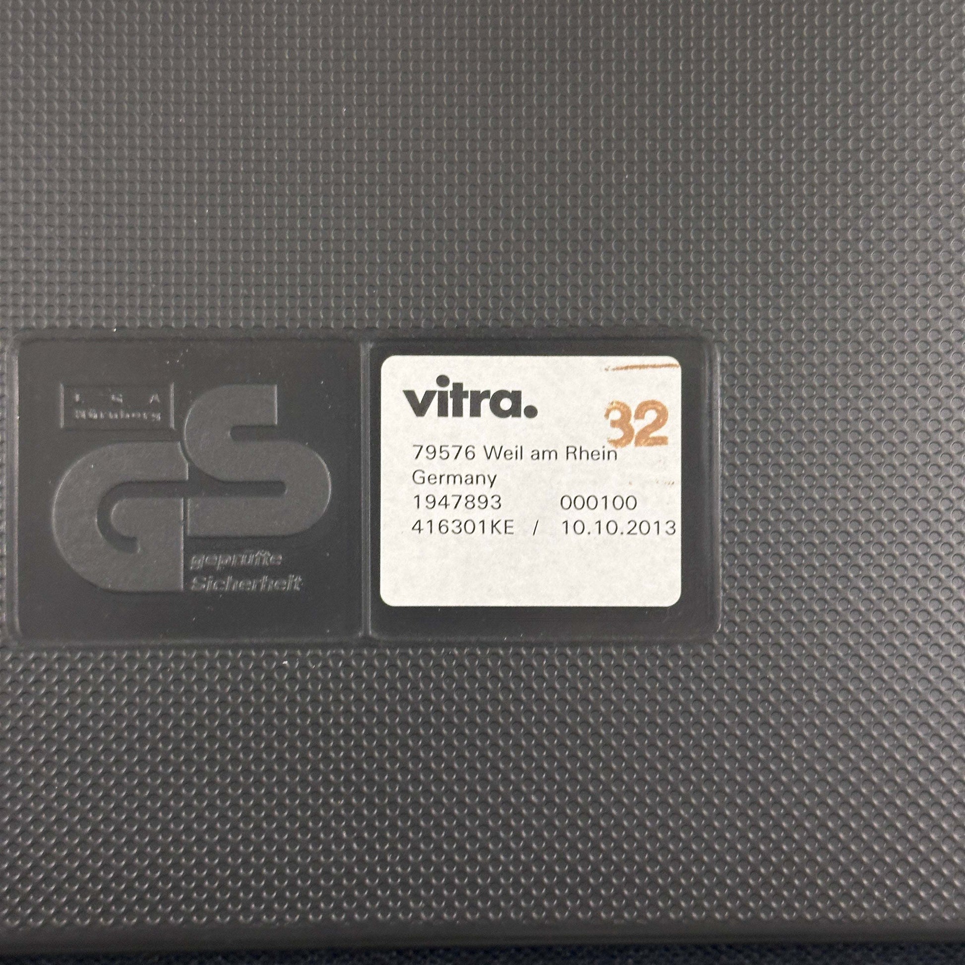 Vitra Visasoft black leather chair label with GS safety certification and manufacturing details