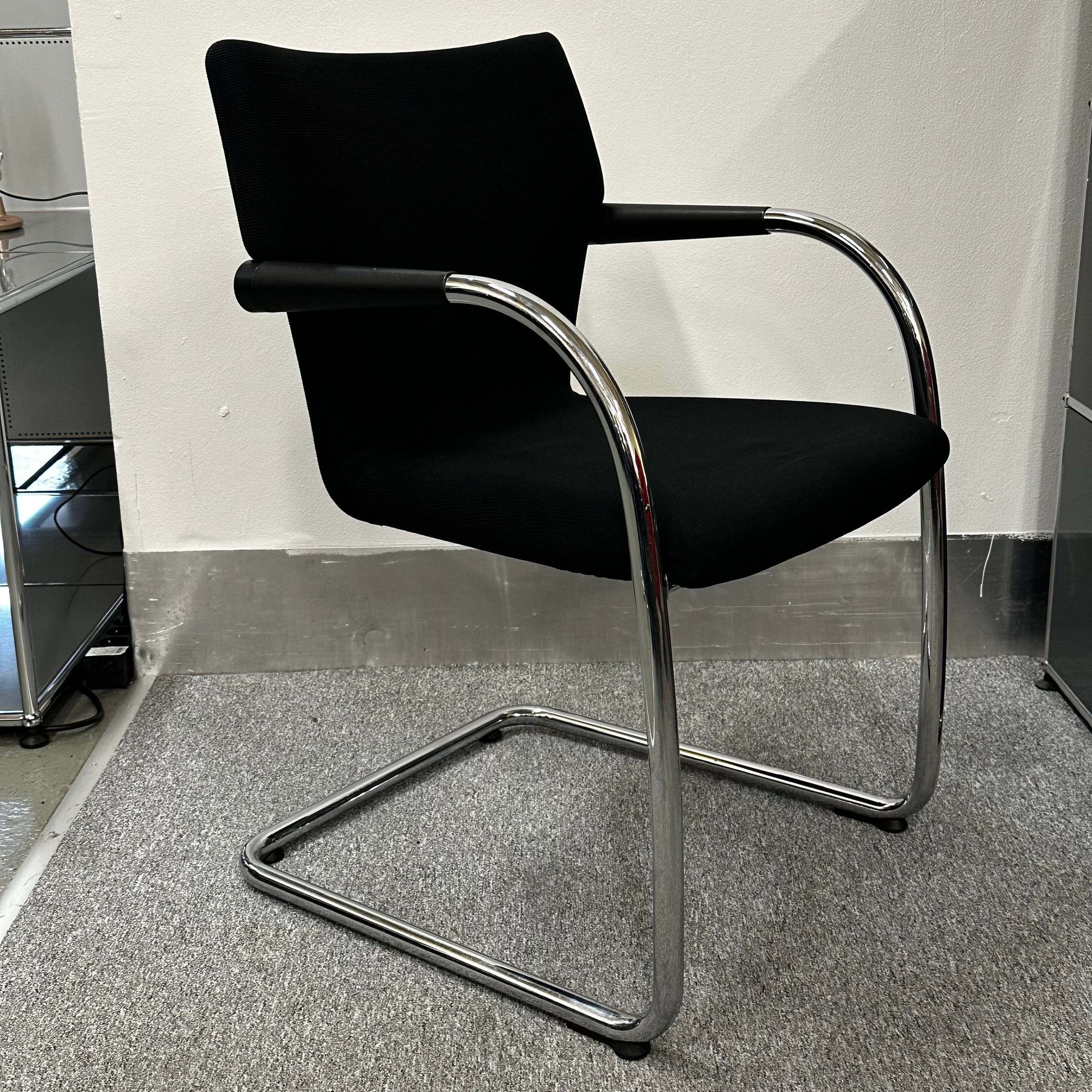Vitra Visastripe black conference chair with chrome cantilever frame and ergonomic design