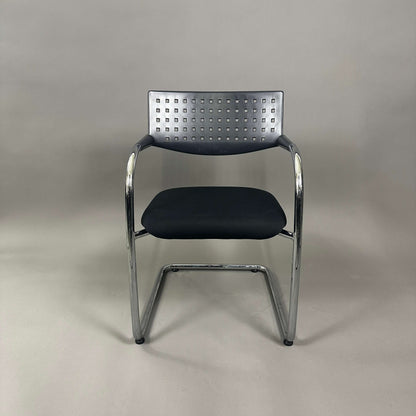 Vitra Visavis 1 black stackable chair with chrome frame and black upholstery