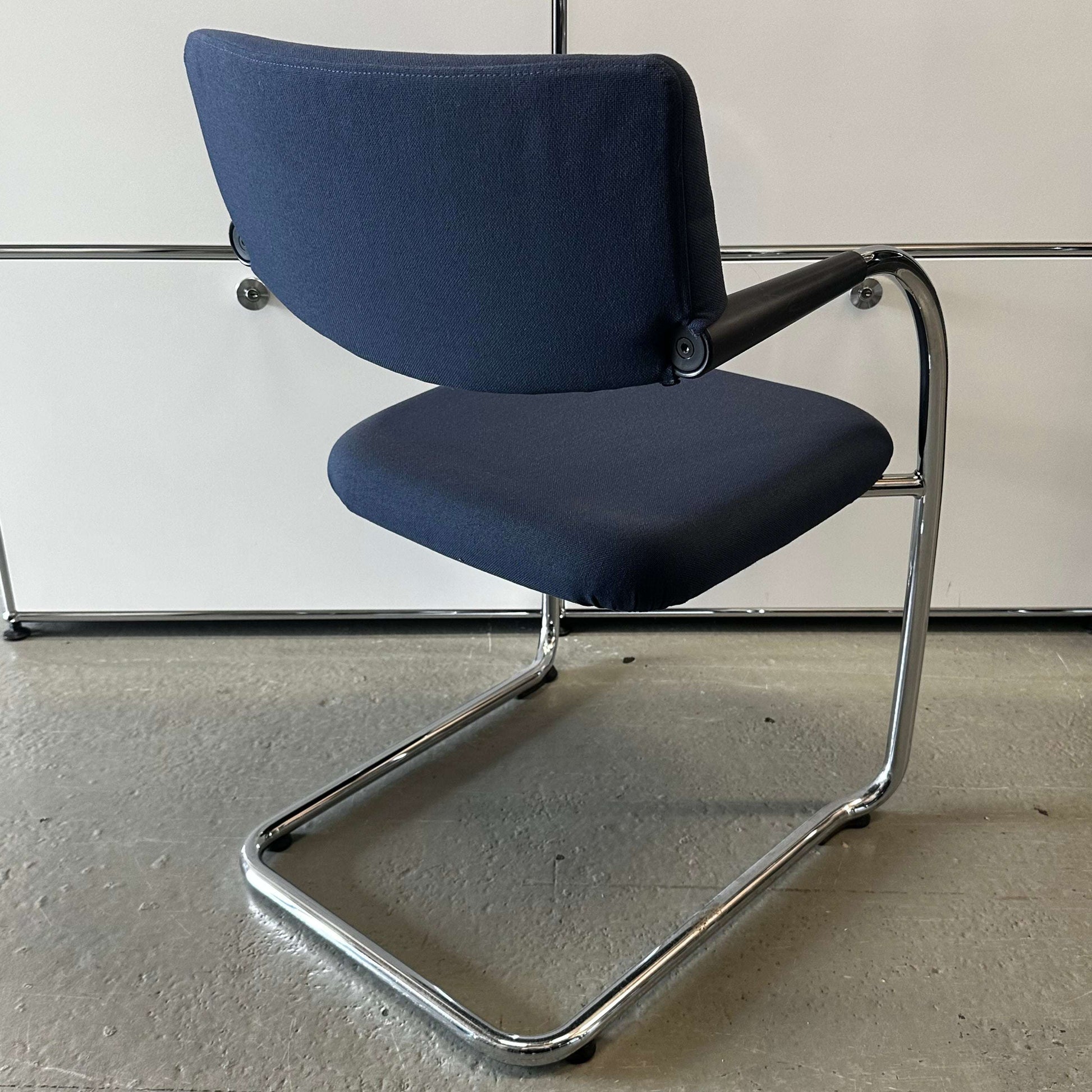 Vitra Visavis dark blue chair with padded softback and chrome cantilever frame