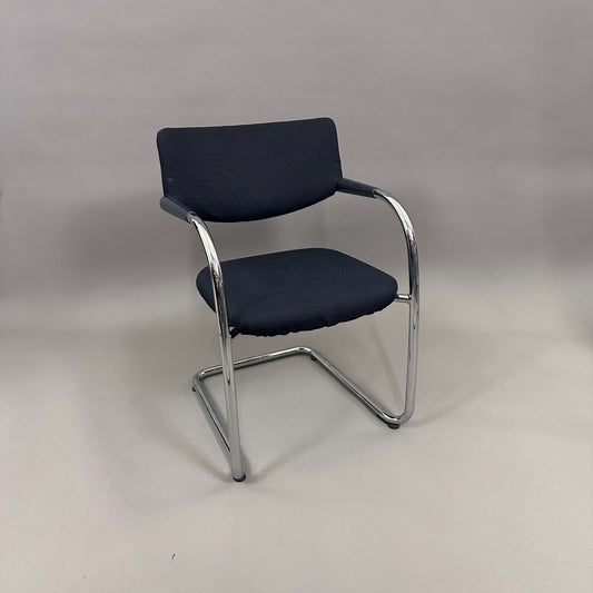 Vitra Visavis Softback black fabric chair with chrome frame and plastic armrests
