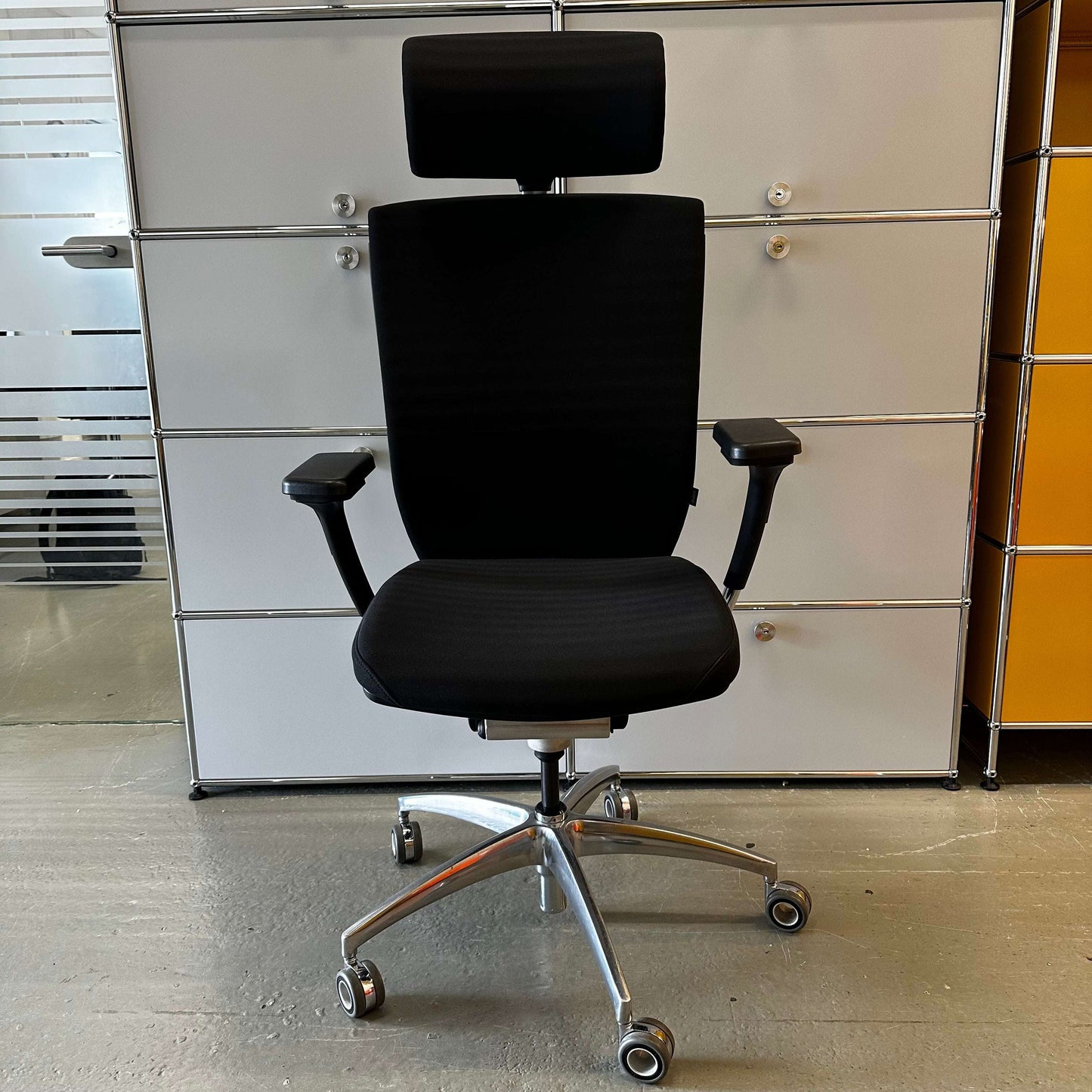 Wagner Titan 20 ergonomic black office chair with headrest and adjustable armrests