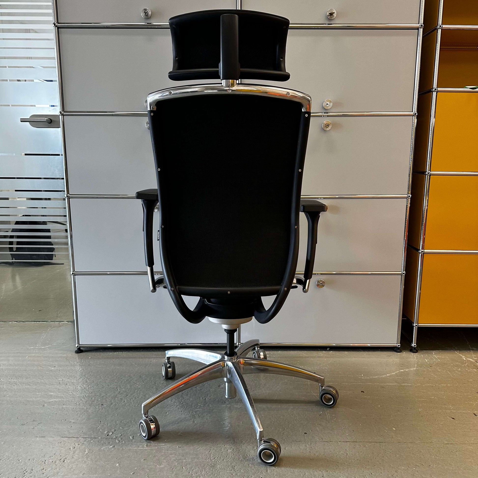 Wagner Titan 20 ergonomic black office chair with headrest and adjustable armrests