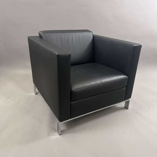 Walter Knoll Foster 500 black leather armchair with chrome-plated spring steel frame