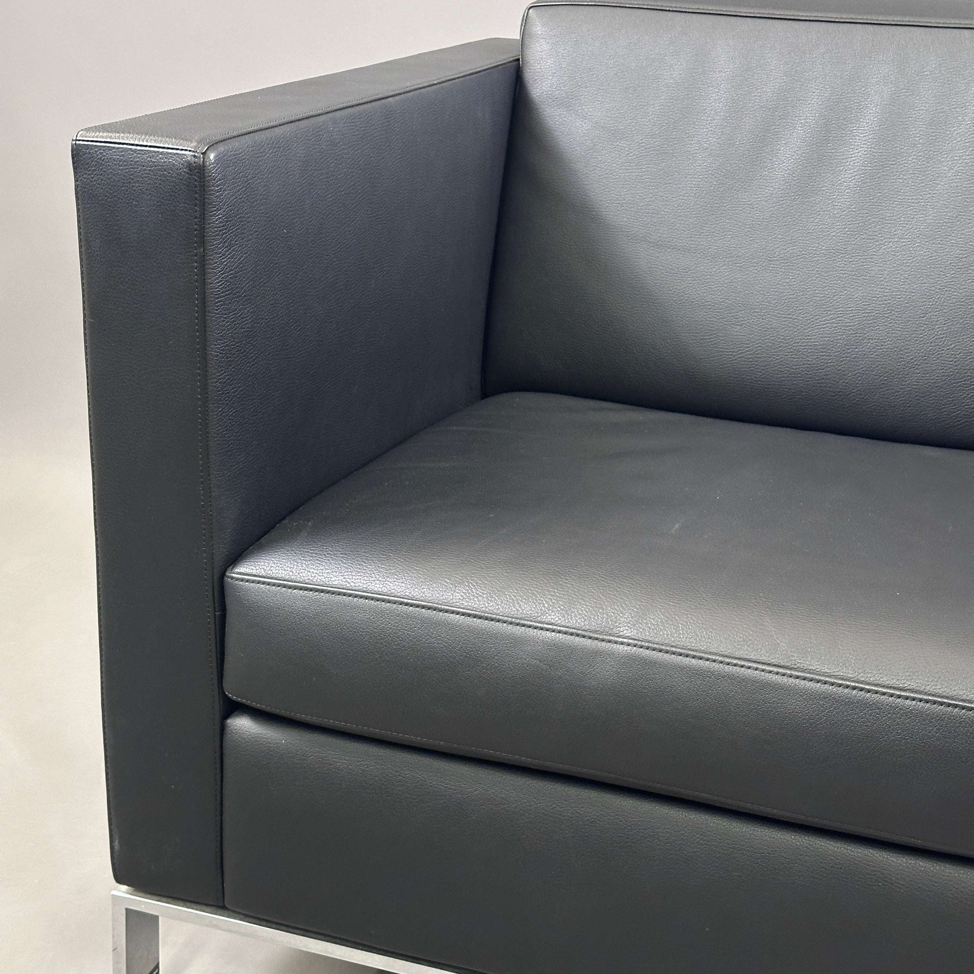 Walter Knoll Foster 500 black leather armchair with chrome-plated spring steel frame