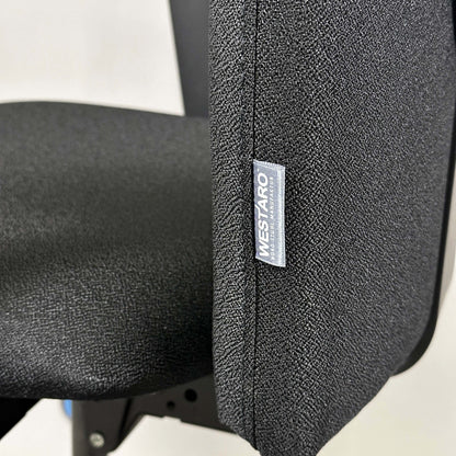 Close-up of black Westaro Enjoy ergonomic office chair fabric and label on backrest