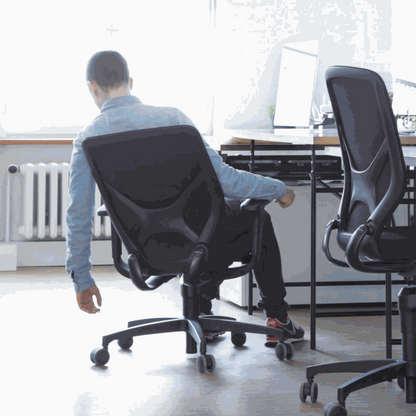 Ergonomic Wilkhahn IN office chair with black fabric, soft casters, adjustable height, 3D armrests, and lumbar support