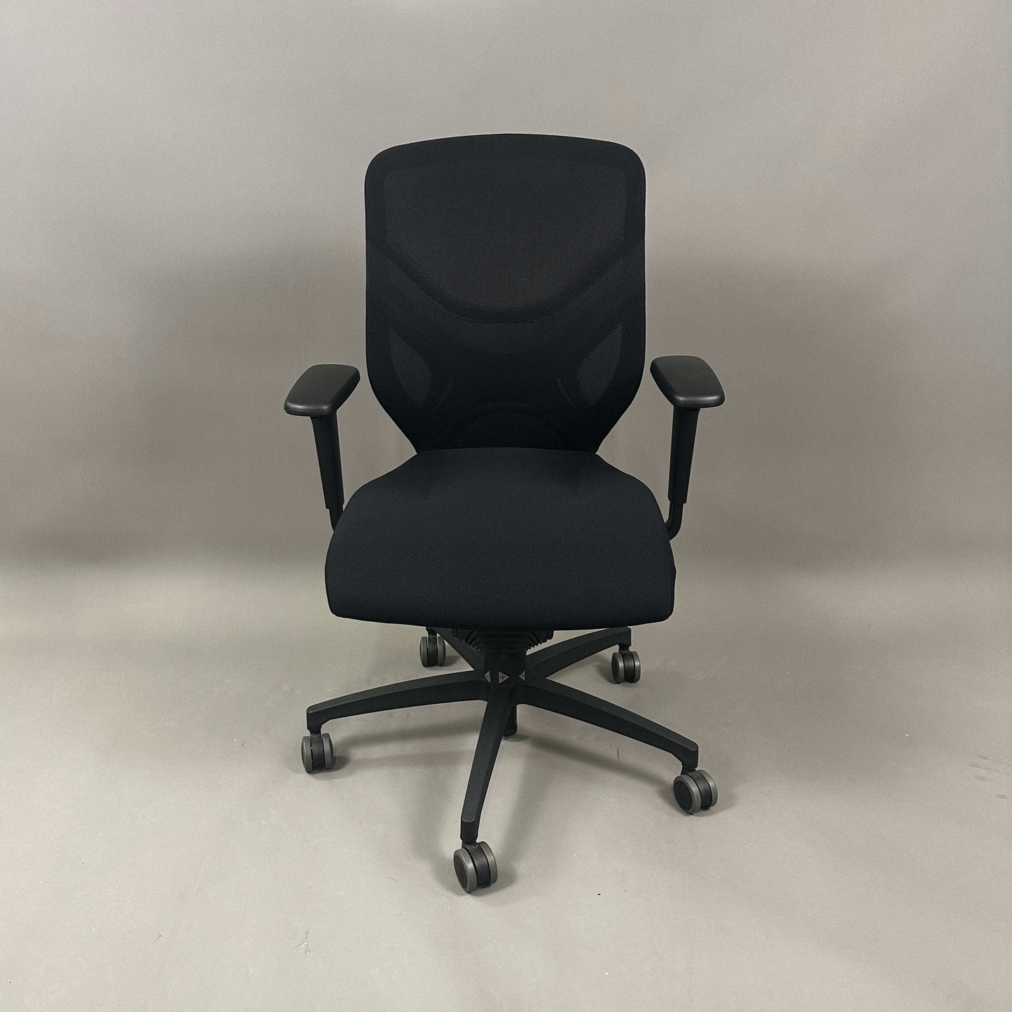 Wilkhahn IN ergonomic black office chair with adjustable height, 3D armrests, and soft wheels for hard floors