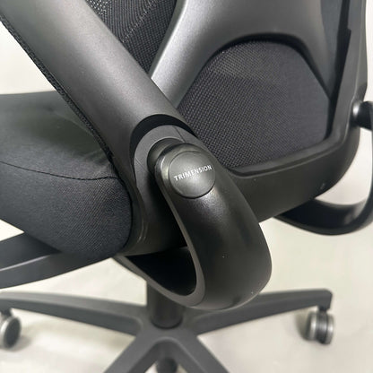 Wilkhahn IN office chair with black fabric, soft wheels for hard floors, 3D armrests, and trimension adjustment.