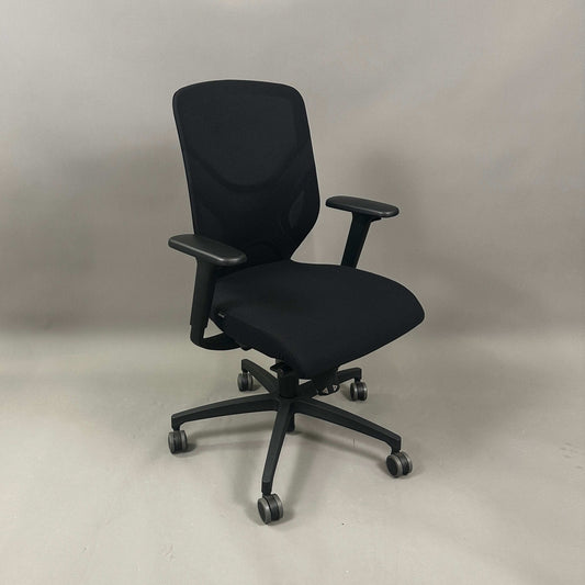Wilkhahn IN ergonomic office chair with black fabric, adjustable height, 3D armrests, and soft wheels for hard floors.