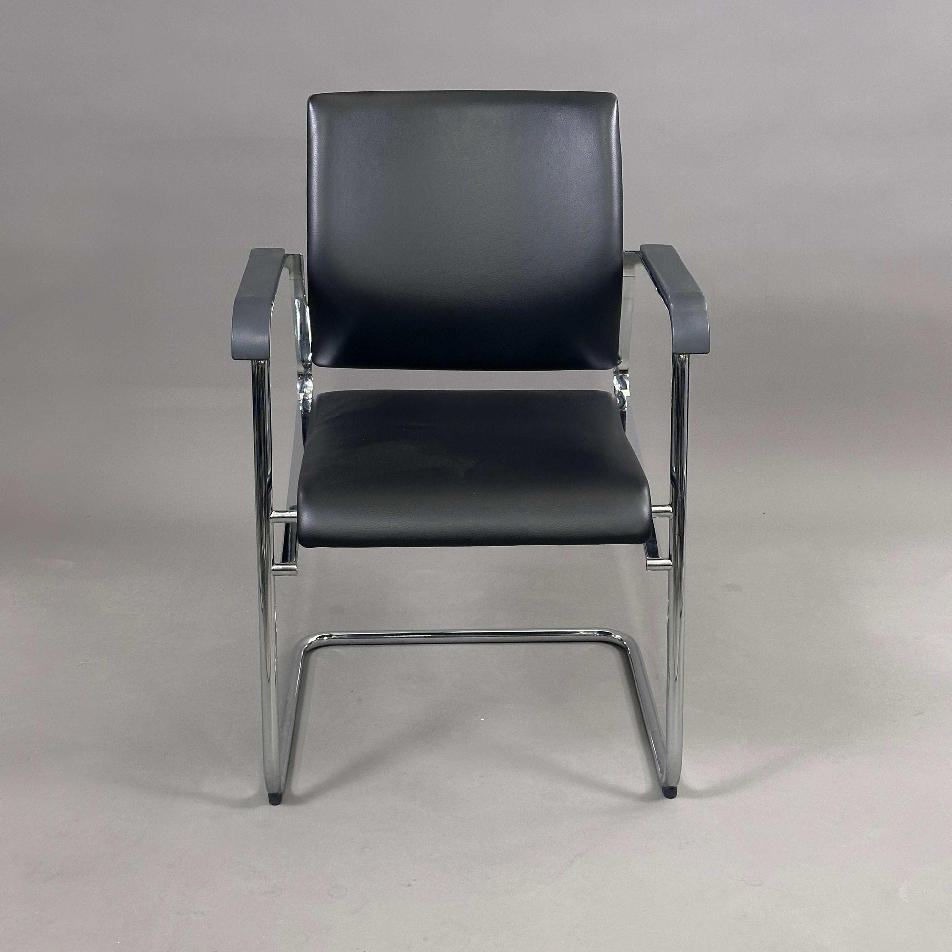 Wilkhahn Sito office chair with black leather seat and chrome frame