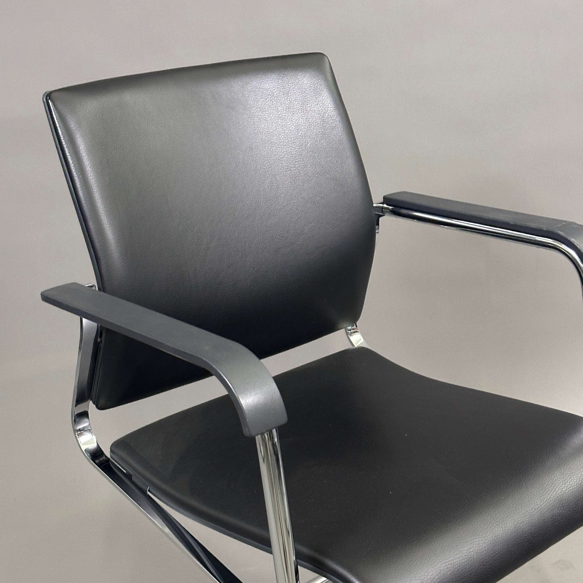 Wilkhahn Sito chair with black leather seat and chrome frame