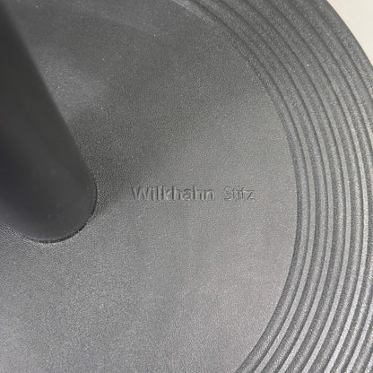 Close-up of Wilkhahn Stehhilfe Stitz standing aid base in black with embossed logo